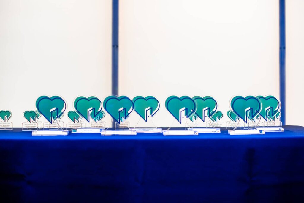 An assortment of Colorado Access employee recognition awards on display